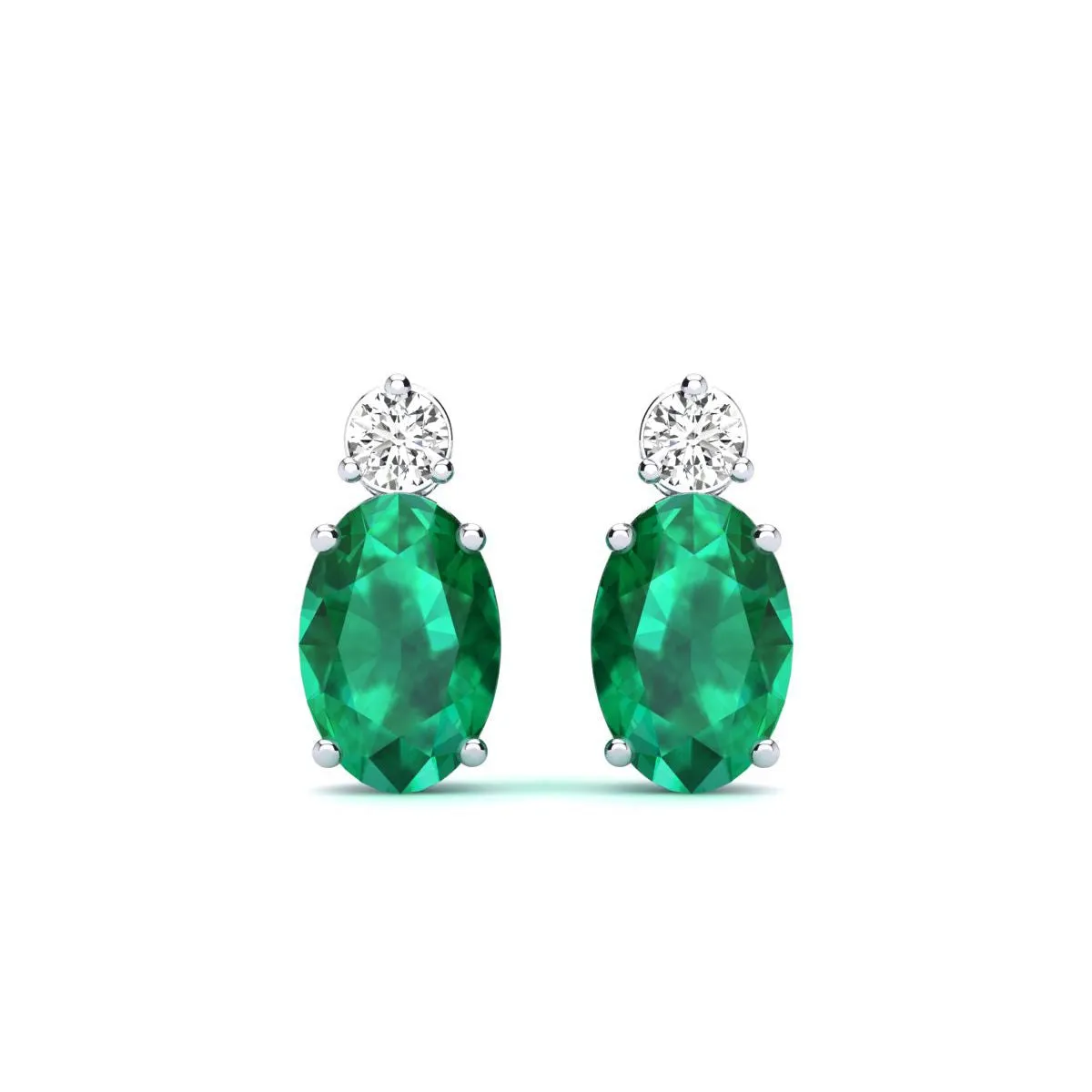 1 Carat Oval Emerald And Diamond Stud Earrings In 14 Karat White Gold