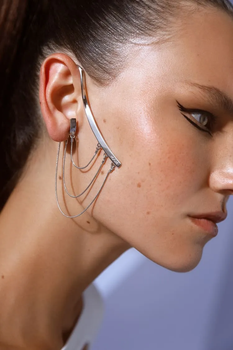 silver ear-cuff with draped chain